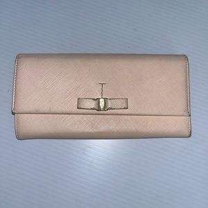Vintage Ferragamo wallet with bow.
